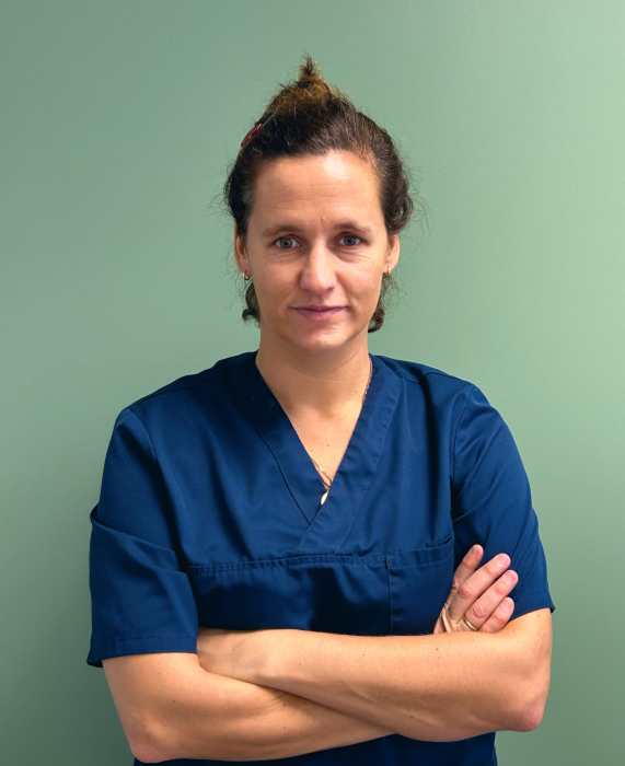 Dr JUSTINE HELUAIN