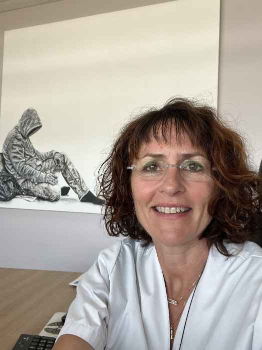 Dr LAURENCE REMION