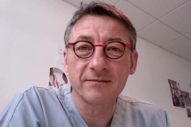Dr Eric Delcour