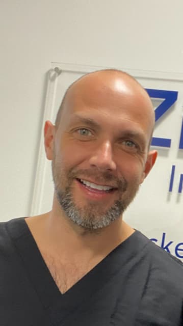 Dr COLIN ROUX