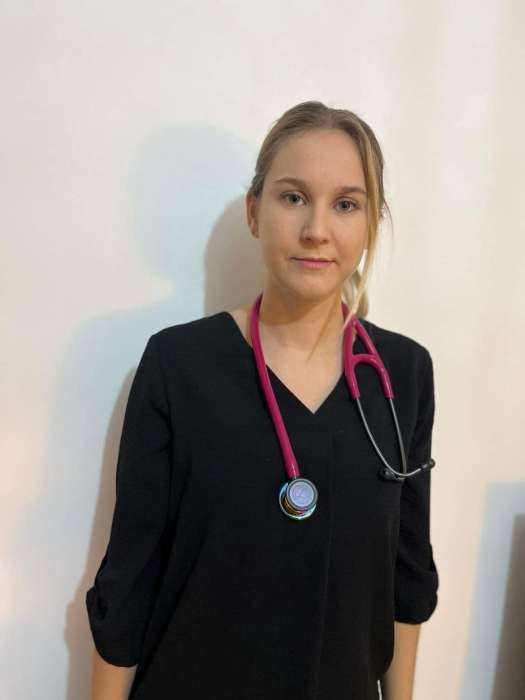 Dr JULIE JANACEK
