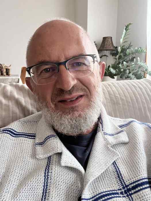 Dr ERIC SERMET