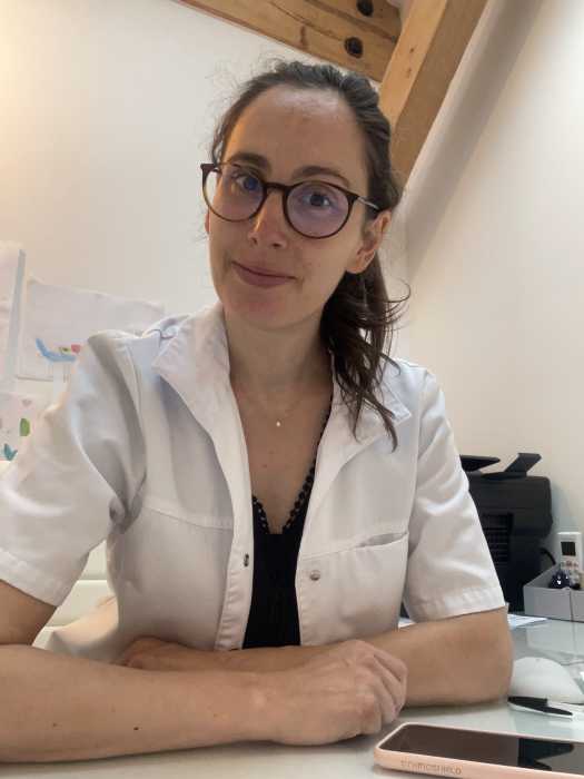 Dr Laure Paci
