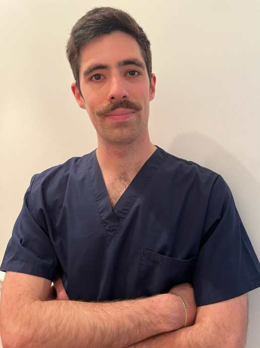 Dr TOM TARGA