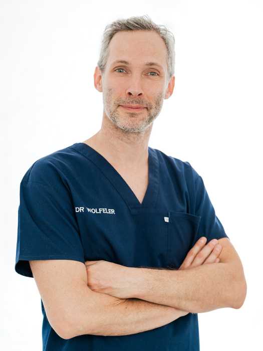 Dr JEAN DAVID WOLFELER