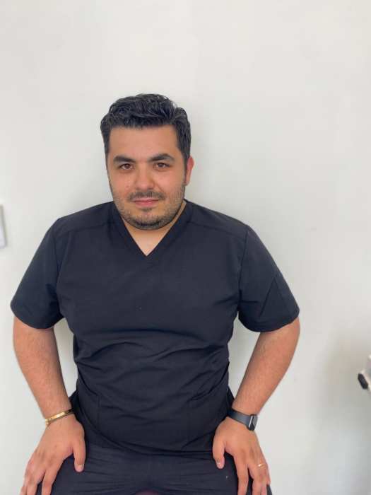 Dr Benjamin Belassein