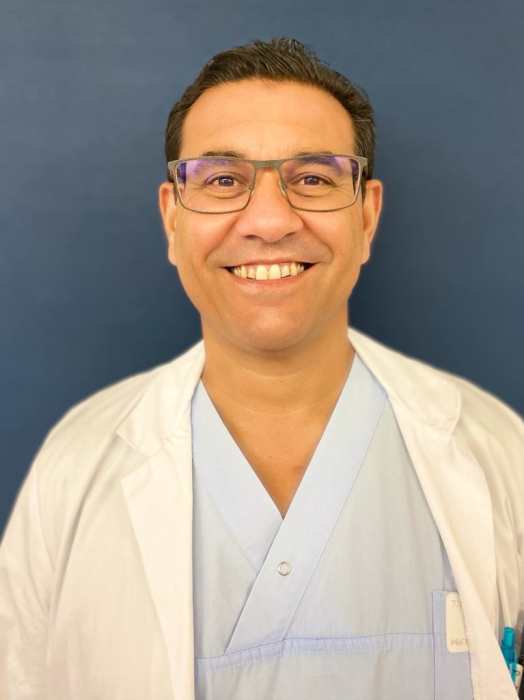 Dr ROGER MATHIAS