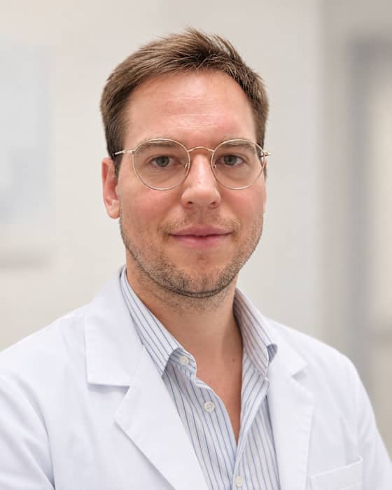 Dr Adrien POMYKALA
