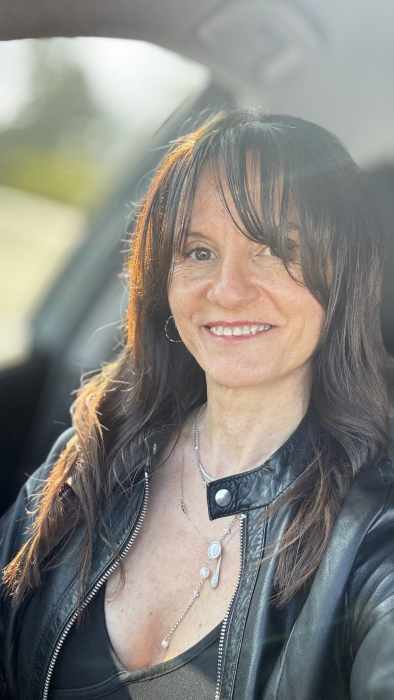 Dr MONICA MALAU