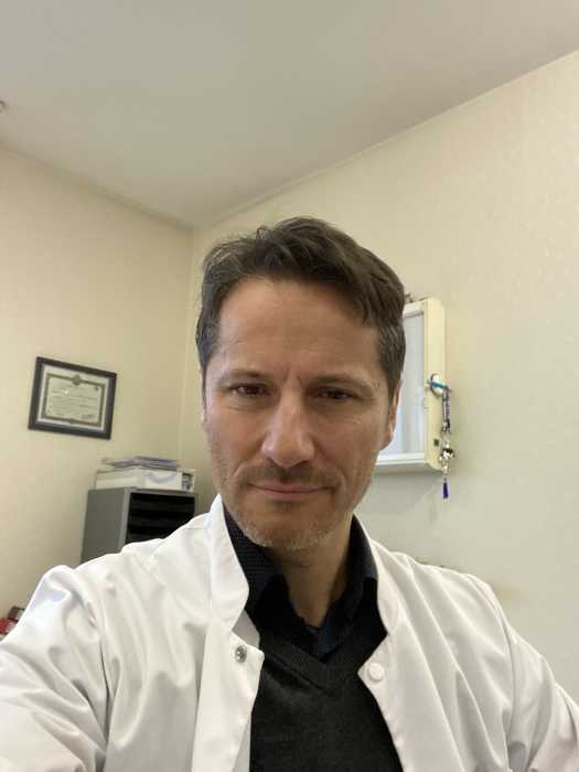 Dr Michel OLONA