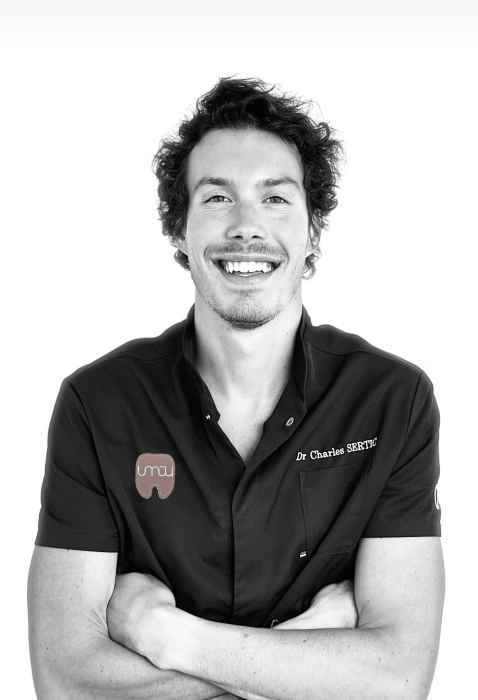 Dr CHARLES SERTIC