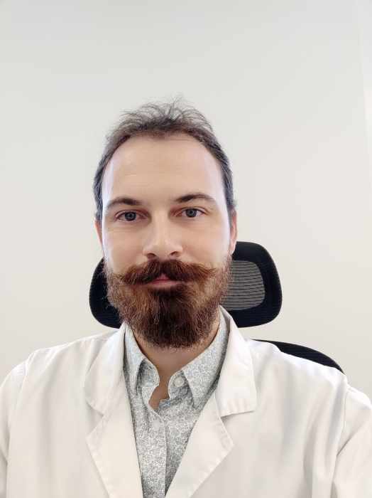 Dr NATHAN JOST