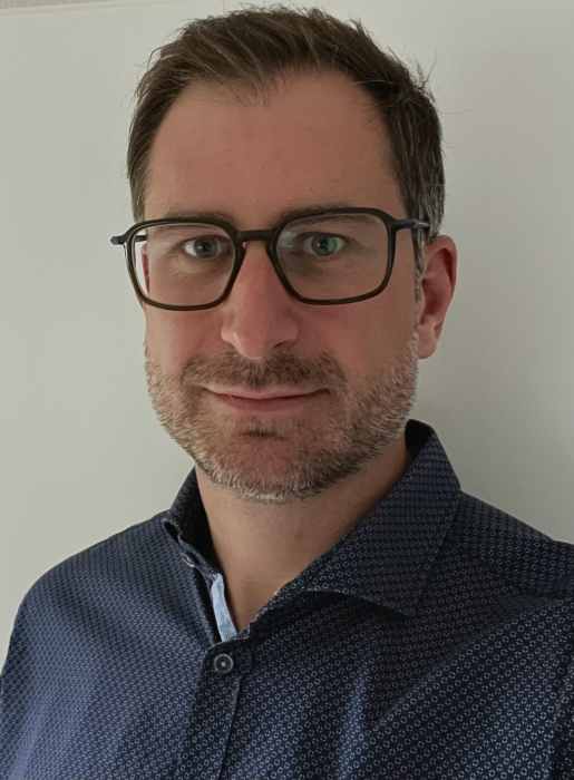Dr JULIAN MELCHIOR
